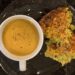 Handva with bowl of tomato soup
